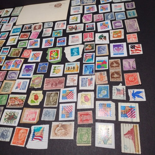 Vintage International Stamp Lot (I1) -Mixed On/Off Paper (US, Spain, Zimbabwe +)