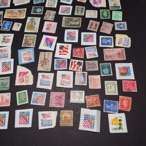 Vintage International Stamp Lot (C1) -Mixed On/Off Paper (Zimbabwe, US, Spain +)