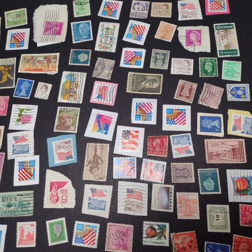 Vintage International Stamp Lot (C1) -Mixed On/Off Paper (Zimbabwe, US, Spain +)