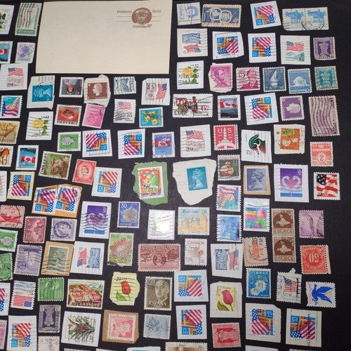 Vintage International Stamp Lot (I1) -Mixed On/Off Paper (US, Spain, Zimbabwe +)