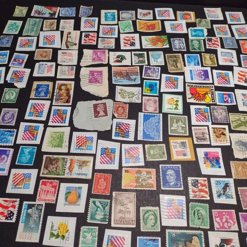 Vintage International Stamp Lot (H1) -Mixed On/Off Paper (US, Spain, Canada, +)