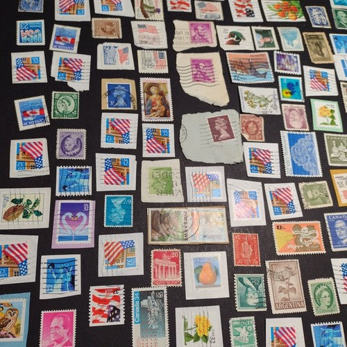 Vintage International Stamp Lot (H1) -Mixed On/Off Paper (US, Spain, Canada, +)