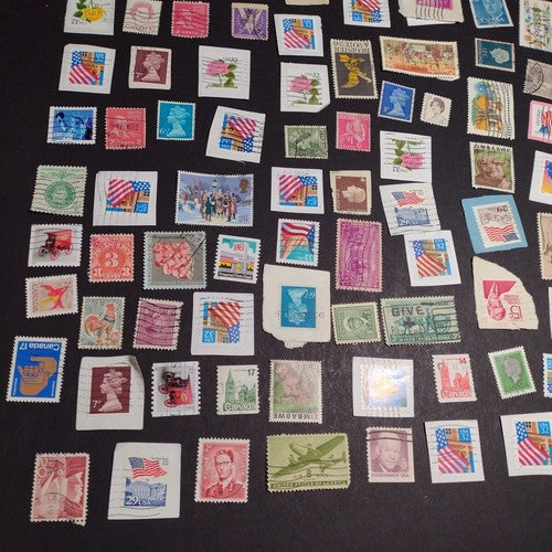 Vintage International Stamp Lot (C1) -Mixed On/Off Paper (Zimbabwe, US, Spain +)