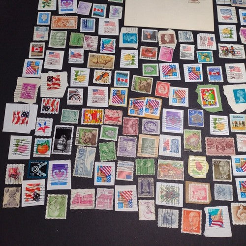 Vintage International Stamp Lot (I1) -Mixed On/Off Paper (US, Spain, Zimbabwe +)