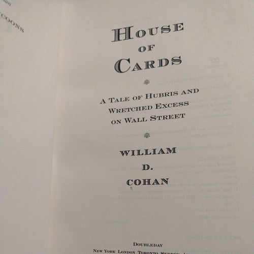 House of Cards : A Tale of Hubris and Wretched Excess on Wall Street by William